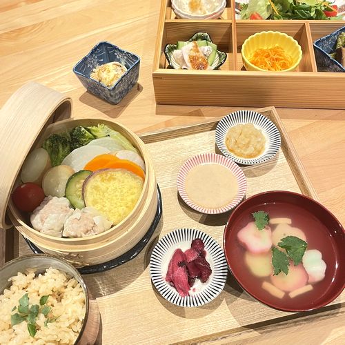 Colorful vegetables and Shumai steamed in Bamboo steamer